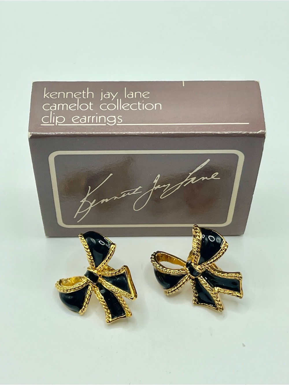 Kenneth Jay Lane Avon Camelot Collection Black & Gold Enamel Bow Clip Earrings